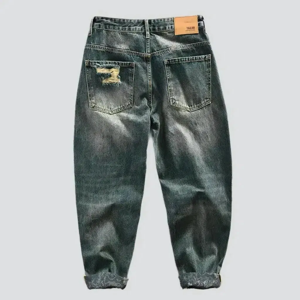 Baggy men's distressed jeans