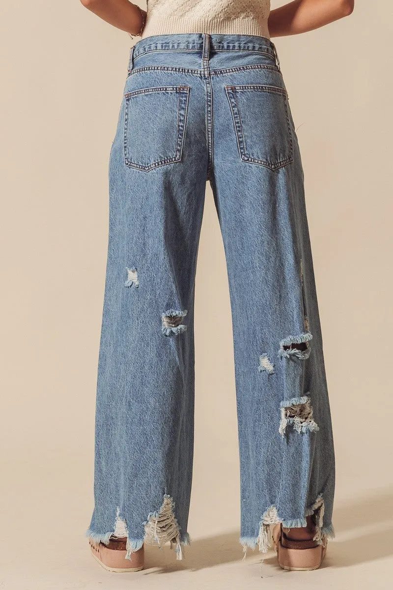 Mid Rise Destructed and Distressed Denim Jeans