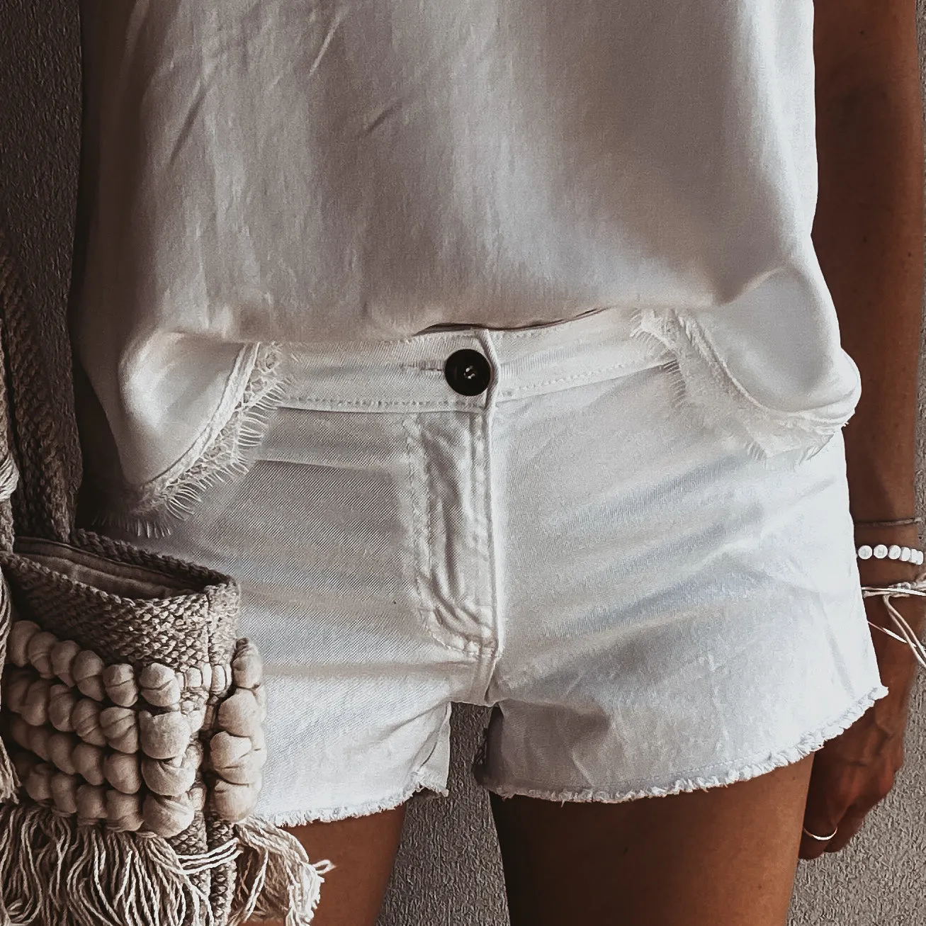 White denim cut off shorts